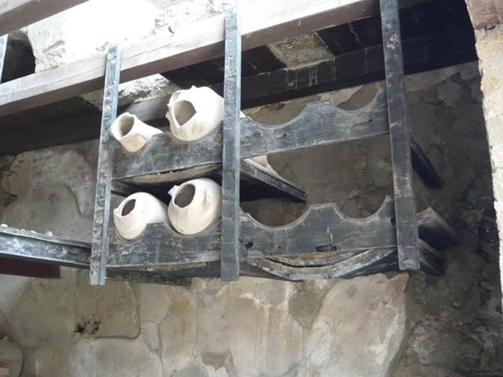 Ins. V.6. May 2009. Amphora rack against south wall. Photo courtesy of Buzz Ferebee.